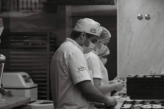 Chef checking food safety checklist in Georgia commercial kitchen